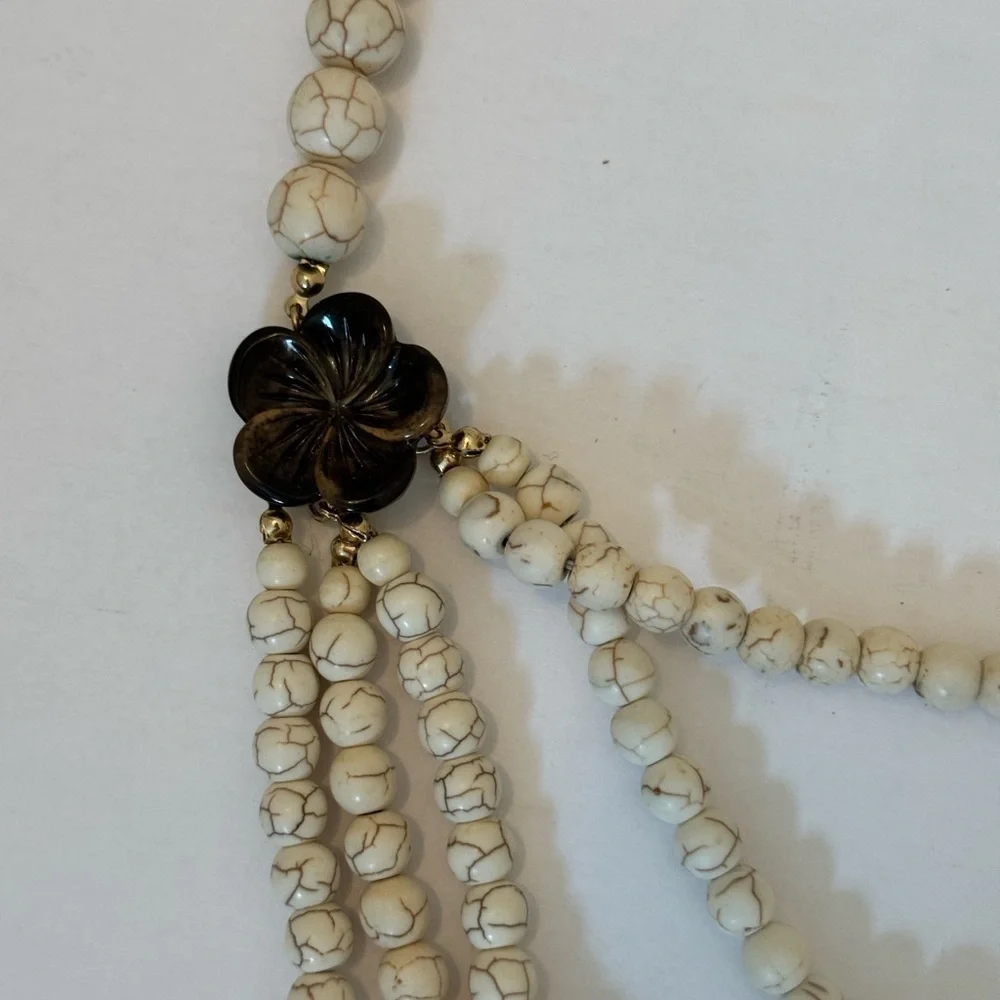 Gorgeous earth tone beaded necklace with brown floral accents